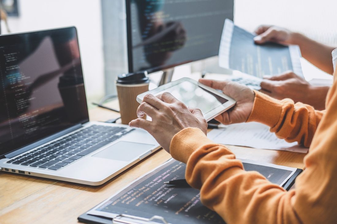 Two developers working on a website project